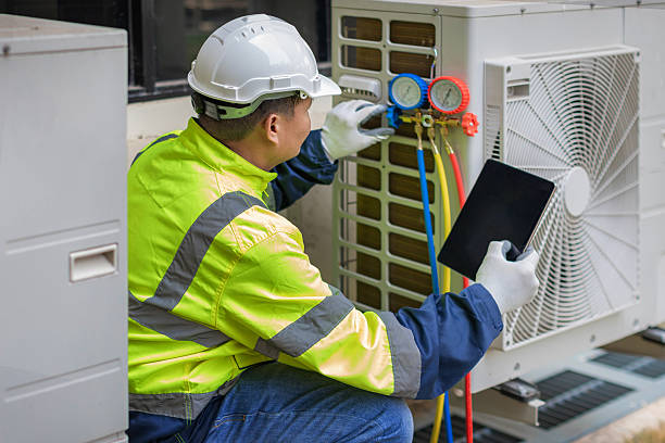 Professional Heat Pump Repair technician working in Brimfield, IL